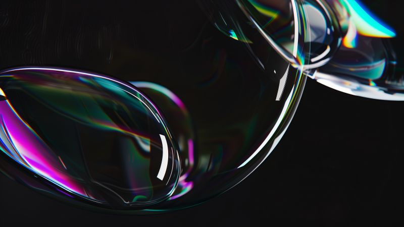 High-quality image of dark, smooth bubbles floating against a deep background, creating a sleek and modern aesthetic.