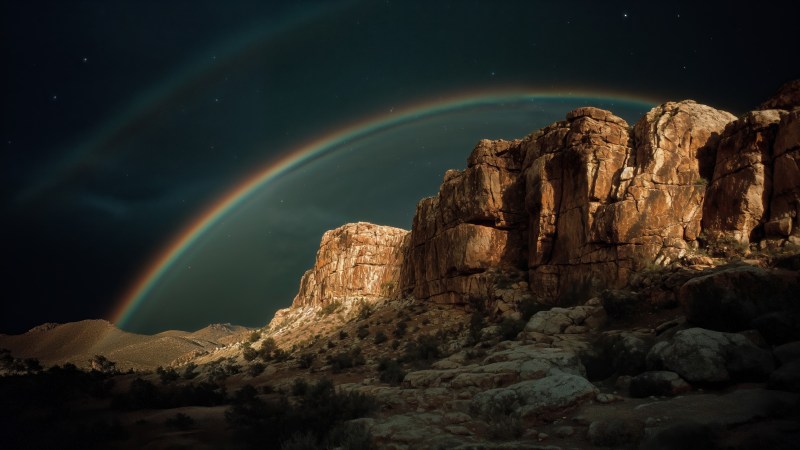 desert night wallpaper, rainbow sky, canyon view, background for desktop wallpaper (horizontal)