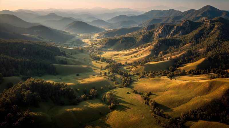 scenic vista wallpaper, mountainous, rugged terrain, background for desktop wallpaper (horizontal)
